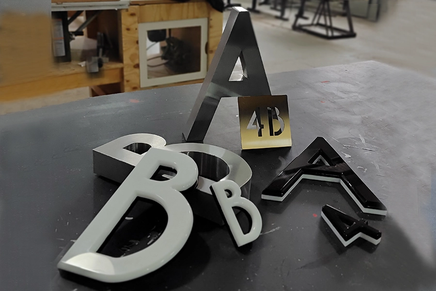 Señalética Acero y Acrílico